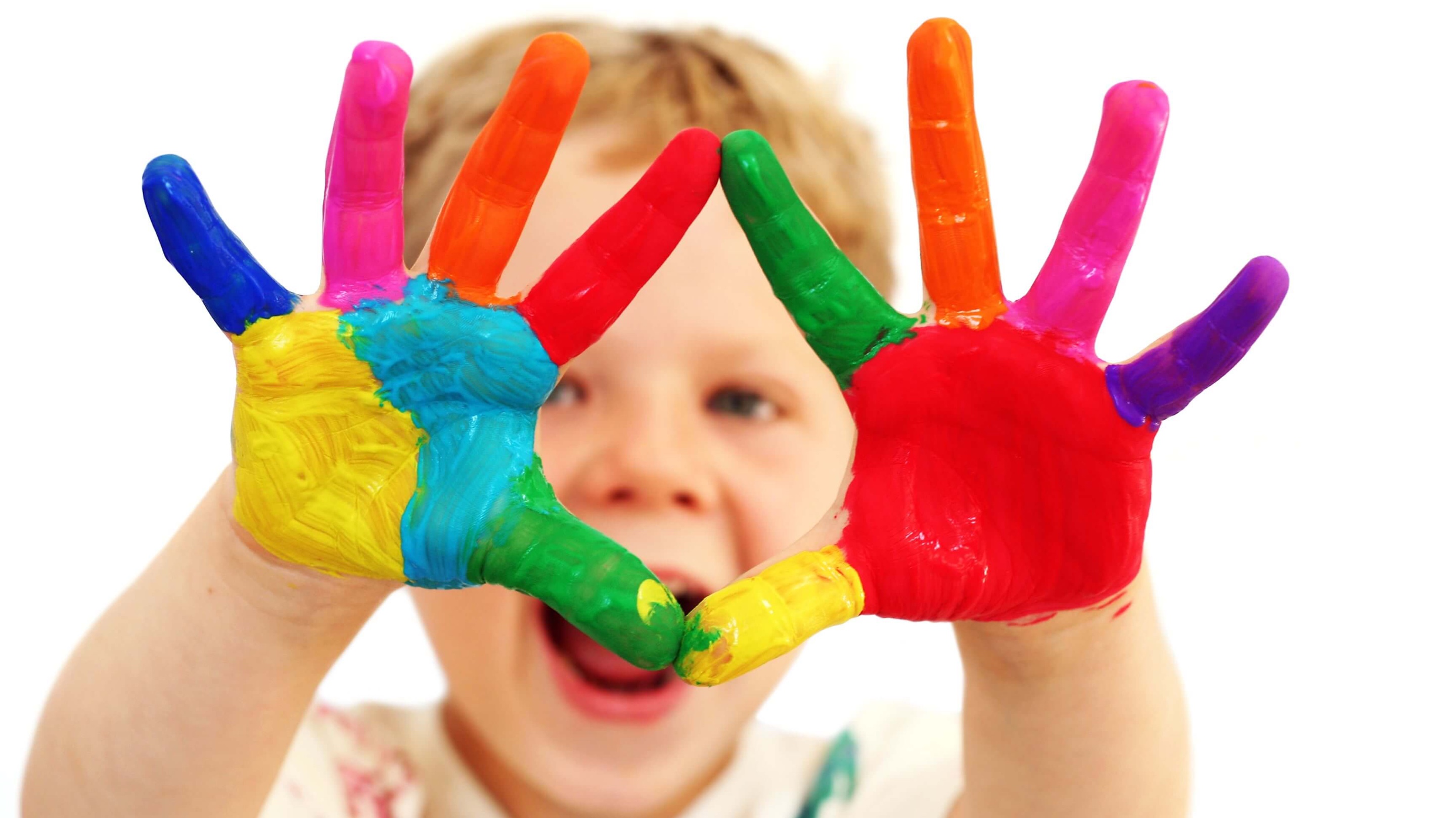 child with colourful hand