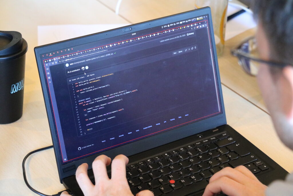 man coding on the laptop